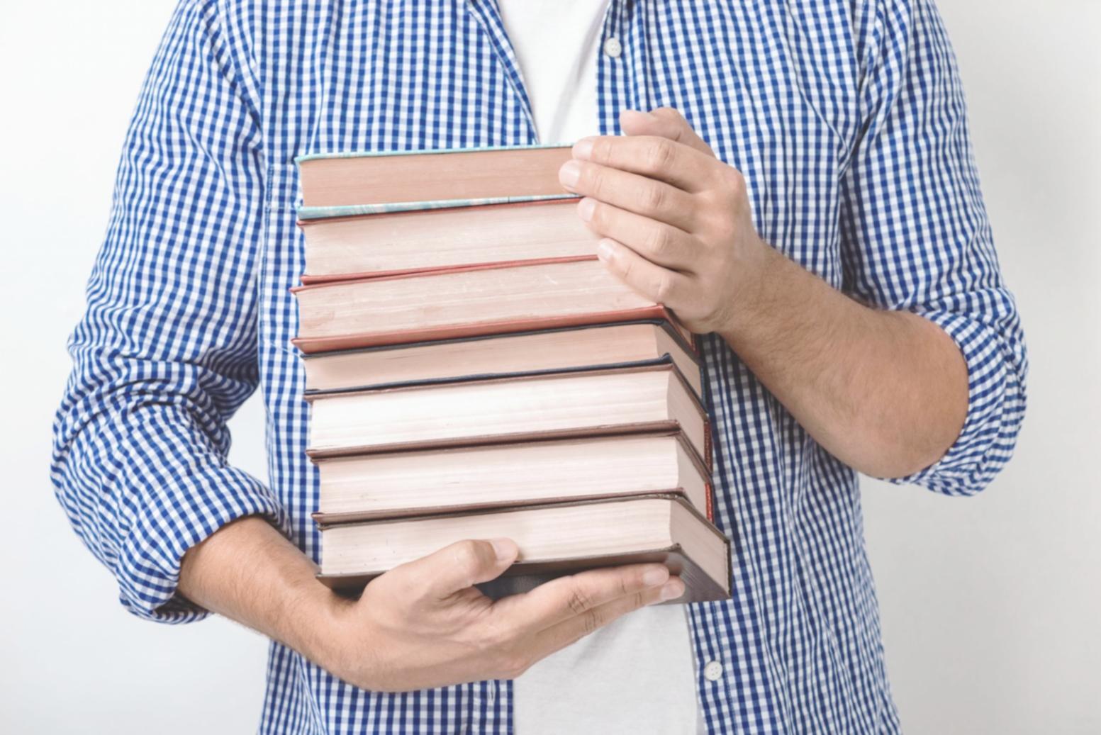 Investment analysis workspace with market charts and research materials